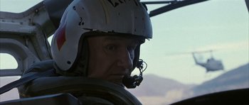 Movie still from “Behind Enemy Lines” (2001), directed by John Moore – A person wearing a helmet; Close Up shot, Low angle
