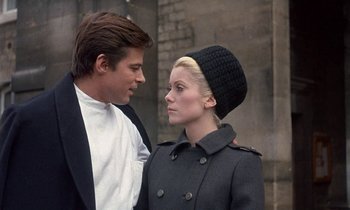 Movie still from “Belle de Jour” (1967), directed by Luis Buñuel – A man and a woman standing next to each other; Close Up shot, Over the shoulder angle