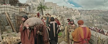 Movie still from “Ben-Hur” (2016), directed by Timur Bekmambetov – A group of people walking around a city; Wide shot, High angle