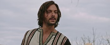 Movie still from “Ben-Hur” (2016), directed by Timur Bekmambetov – A person with long brown hair; Close Up shot, Low angle