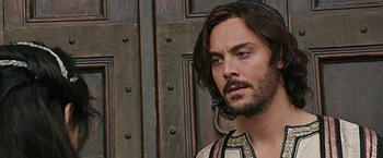 Movie still from “Ben-Hur” (2016), directed by Timur Bekmambetov – A person with a beard; Close Up shot, Over the shoulder angle