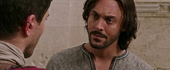 Movie still from “Ben-Hur” (2016), directed by Timur Bekmambetov – A person with a beard; Close Up shot, Over the shoulder angle