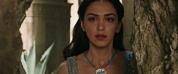 Movie still from “Ben-Hur” (2016), directed by Timur Bekmambetov – A person wearing a necklace; Close Up shot, Over the shoulder angle