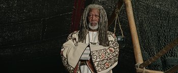 Movie still from “Ben-Hur” (2016), directed by Timur Bekmambetov – An older man with dreadlocks wearing a robe; Medium shot, High angle