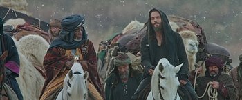 Movie still from “Ben-Hur” (2016), directed by Timur Bekmambetov – A group of men riding on the backs of horses; Medium shot, Low angle