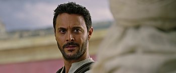 Movie still from “Ben-Hur” (2016), directed by Timur Bekmambetov – A person with a beard; Close Up shot, Over the shoulder angle