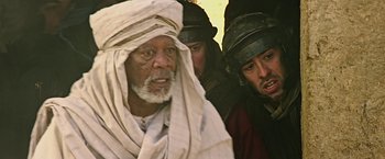 Movie still from “Ben-Hur” (2016), directed by Timur Bekmambetov – A group of men standing next to each other; Close Up shot, Over the shoulder angle