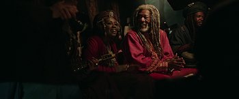 Movie still from “Ben-Hur” (2016), directed by Timur Bekmambetov – A man and a woman sitting next to each other; Medium shot, Over the shoulder angle