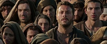 Movie still from “Ben-Hur” (2016), directed by Timur Bekmambetov – A group of people standing in a crowd; Close Up shot, High angle
