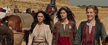 Movie still from “Ben-Hur” (2016), directed by Timur Bekmambetov – A couple of women standing next to each other on top of a hill; Medium shot, Low angle
