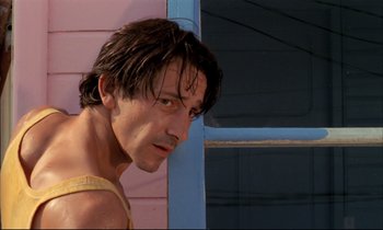 Movie still from “Betty Blue” (1986), directed by Jean-Jacques Beineix – A person with wet hair; Close Up shot, Low angle