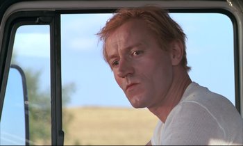 Movie still from “Betty Blue” (1986), directed by Jean-Jacques Beineix – A person looking out of a car window; Close Up shot, Low angle