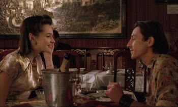 Movie still from “Betty Blue” (1986), directed by Jean-Jacques Beineix – A man and a woman sitting at a table in a restaurant; Close Up shot, Over the shoulder angle