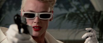 Movie still from “Beverly Hills Cop II” (1987), directed by Tony Scott – A person wearing sunglasses; Close Up shot, Low angle