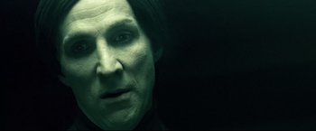 A woman's face in the dark