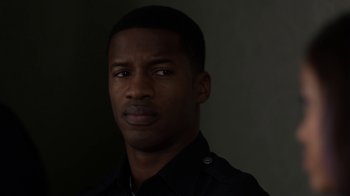 Movie still from “Beyond the Lights” (2014), directed by Gina Prince-Bythewood – A person wearing a black shirt; Close Up shot, Over the shoulder angle