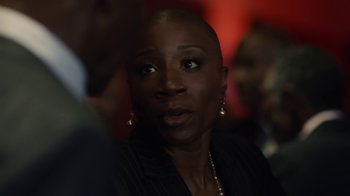 Movie still from “Beyond the Lights” (2014), directed by Gina Prince-Bythewood – A person wearing a suit and tie; Close Up shot, Over the shoulder angle