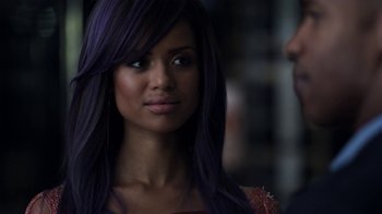 Movie still from “Beyond the Lights” (2014), directed by Gina Prince-Bythewood – A person with purple hair; Close Up shot, Over the shoulder angle