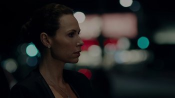 Movie still from “Beyond the Lights” (2014), directed by Gina Prince-Bythewood – A woman in a black jacket looking to her left; Close Up shot, Over the shoulder angle