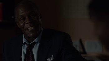 Movie still from “Beyond the Lights” (2014), directed by Gina Prince-Bythewood – A person wearing a suit and tie; Close Up shot, Over the shoulder angle