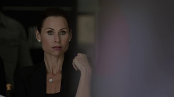 Movie still from “Beyond the Lights” (2014), directed by Gina Prince-Bythewood – A woman in a black jacket is looking at the camera; Close Up shot, Over the shoulder angle