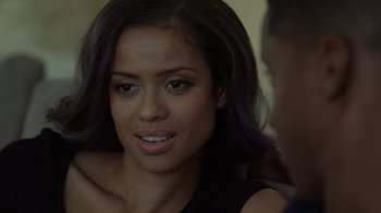 Movie still from “Beyond the Lights” (2014), directed by Gina Prince-Bythewood – A person sitting down looking at the camera; Close Up shot, Over the shoulder angle