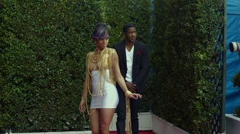 Movie still from “Beyond the Lights” (2014), directed by Gina Prince-Bythewood – A man and a woman standing next to each other on a red carpet; Wide shot, High angle