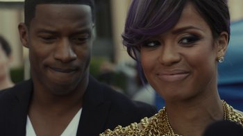 Movie still from “Beyond the Lights” (2014), directed by Gina Prince-Bythewood – A man and a woman standing next to each other; Close Up shot, Over the shoulder angle