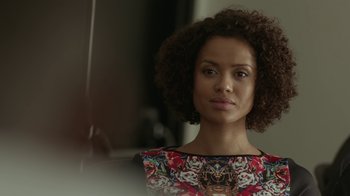 Movie still from “Beyond the Lights” (2014), directed by Gina Prince-Bythewood – A person wearing a dress; Close Up shot, Over the shoulder angle