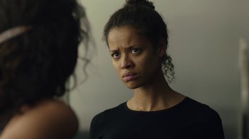 Movie still from “Beyond the Lights” (2014), directed by Gina Prince-Bythewood – A woman looking at herself in the mirror; Close Up shot, Over the shoulder angle