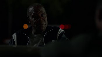 Movie still from “Beyond the Lights” (2014), directed by Gina Prince-Bythewood – A person sitting in a dark room; Close Up shot, Over the shoulder angle