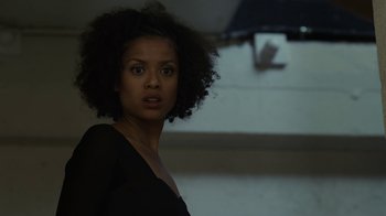 Movie still from “Beyond the Lights” (2014), directed by Gina Prince-Bythewood – A woman in a black shirt is standing in front of a window; Close Up shot, Low angle