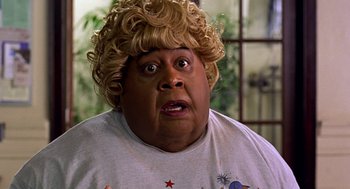 Movie still from “Big Momma's House” (2000), directed by Raja Gosnell – A person wearing a wig; Close Up shot, High angle