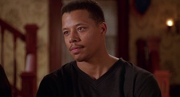 Movie still from “Big Momma's House” (2000), directed by Raja Gosnell – A person wearing a black shirt; Close Up shot, Low angle