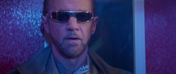 Movie still from “Bill & Ted's Excellent Adventure” (1989), directed by Stephen Herek – A person wearing sunglasses; Close Up shot, Low angle