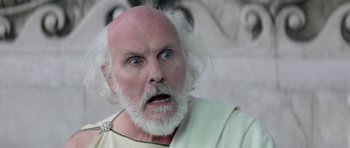 Movie still from “Bill & Ted's Excellent Adventure” (1989), directed by Stephen Herek – An old man with white hair and a white beard; Close Up shot, Low angle