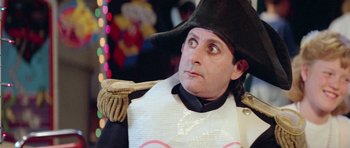 Movie still from “Bill & Ted's Excellent Adventure” (1989), directed by Stephen Herek – A man dressed as a pirate holding a wooden stick; Close Up shot, Over the shoulder angle