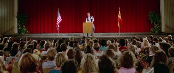 Movie still from “Bill & Ted's Excellent Adventure” (1989), directed by Stephen Herek – A man is giving a speech to a crowd of people; Wide shot, High angle
