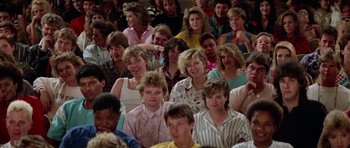 Movie still from “Bill & Ted's Excellent Adventure” (1989), directed by Stephen Herek – A group of people sitting in front of each other; Medium shot, High angle