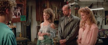 Movie still from “Bill & Ted's Excellent Adventure” (1989), directed by Stephen Herek – A man and a woman standing next to each other; Medium shot, Over the shoulder angle