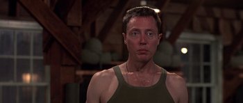 Movie still from “Biloxi Blues” (1988), directed by Mike Nichols – A person wearing a tank top; Close Up shot, Low angle