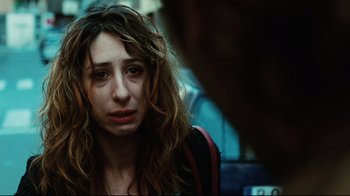 Movie still from “Biutiful” (2010), directed by Alejandro G. Iñárritu – A person sitting in a chair; Close Up shot, Over the shoulder angle