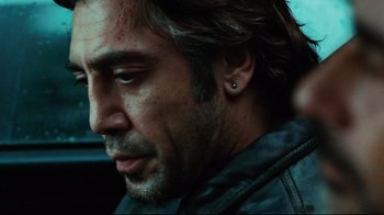 Movie still from “Biutiful” (2010), directed by Alejandro G. Iñárritu – A person wearing a leather jacket; Close Up shot, Over the shoulder angle