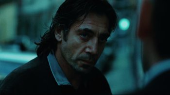 Movie still from “Biutiful” (2010), directed by Alejandro G. Iñárritu – A person with long hair; Close Up shot, Low angle