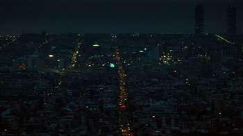 Movie still from “Biutiful” (2010), directed by Alejandro G. Iñárritu – A view of a city at night from a high point; Extreme Wide shot, High angle