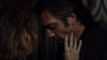 Movie still from “Biutiful” (2010), directed by Alejandro G. Iñárritu – A man and a woman touching their noses; Close Up shot, Over the shoulder angle
