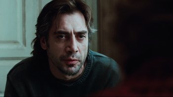 Movie still from “Biutiful” (2010), directed by Alejandro G. Iñárritu – A person looking at the camera; Close Up shot, Over the shoulder angle