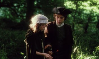 Movie still from “Black Jack” (1979), directed by Ken Loach – A man and a woman dressed in period clothing; Medium shot, High angle