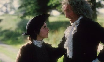 Movie still from “Black Jack” (1979), directed by Ken Loach – A man and a boy in a period costume; Medium shot, Over the shoulder angle