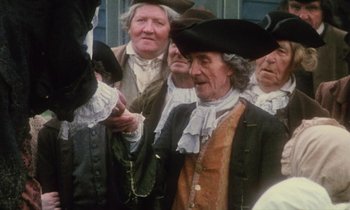 Movie still from “Black Jack” (1979), directed by Ken Loach – A group of people dressed in period clothing; Medium shot, High angle